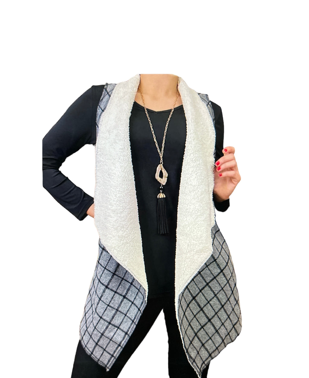 outerwear vest features a Gray and Black plaid pattern and is Sherpa lined. It is specifically designed to fit Plus-1X sized women and includes pockets for storage