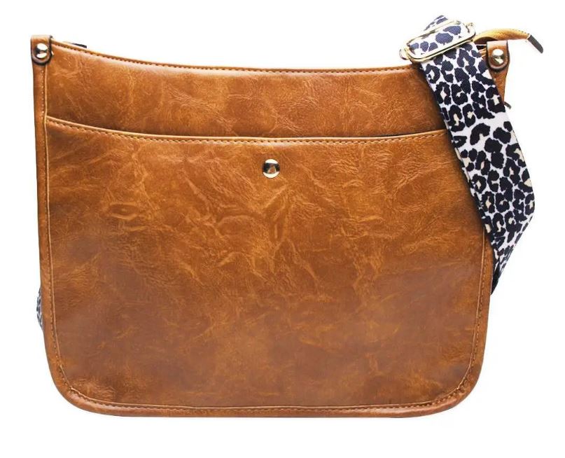 Ladies zippered pocket & interior pocket. Shoulder strap: 30"-50" buckle to buckle. Gold hardware. Perfect for everyday use & travel. 9" W x 9" H x 3.5" D.