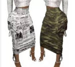 Load image into Gallery viewer, Women&#39;s News Printed or Camouflage Pocket Long Skirt adies long printed skirts with large deep pockets on both sides light stretch material, 35% cotton/65% polyester. Wide elastic waist, drawstrings on each side of skirt, light weight material for comfort. Casual or dress attire. 
